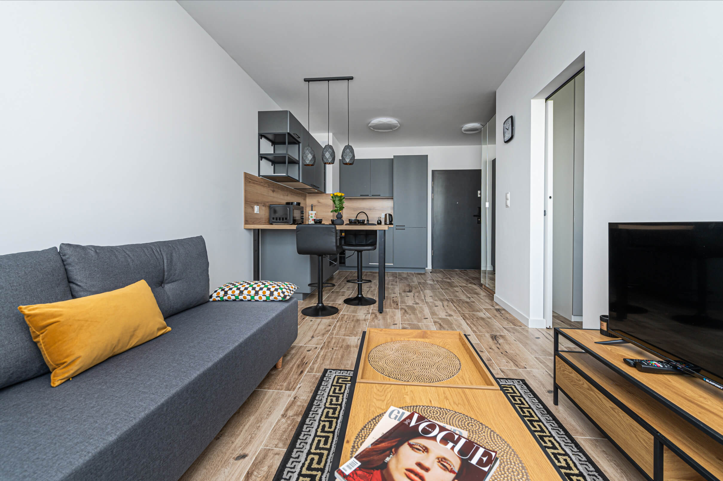 Apartament Paryż Gdańsk – salon z kuchnią